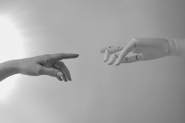 Human and Droid Fingers Touch